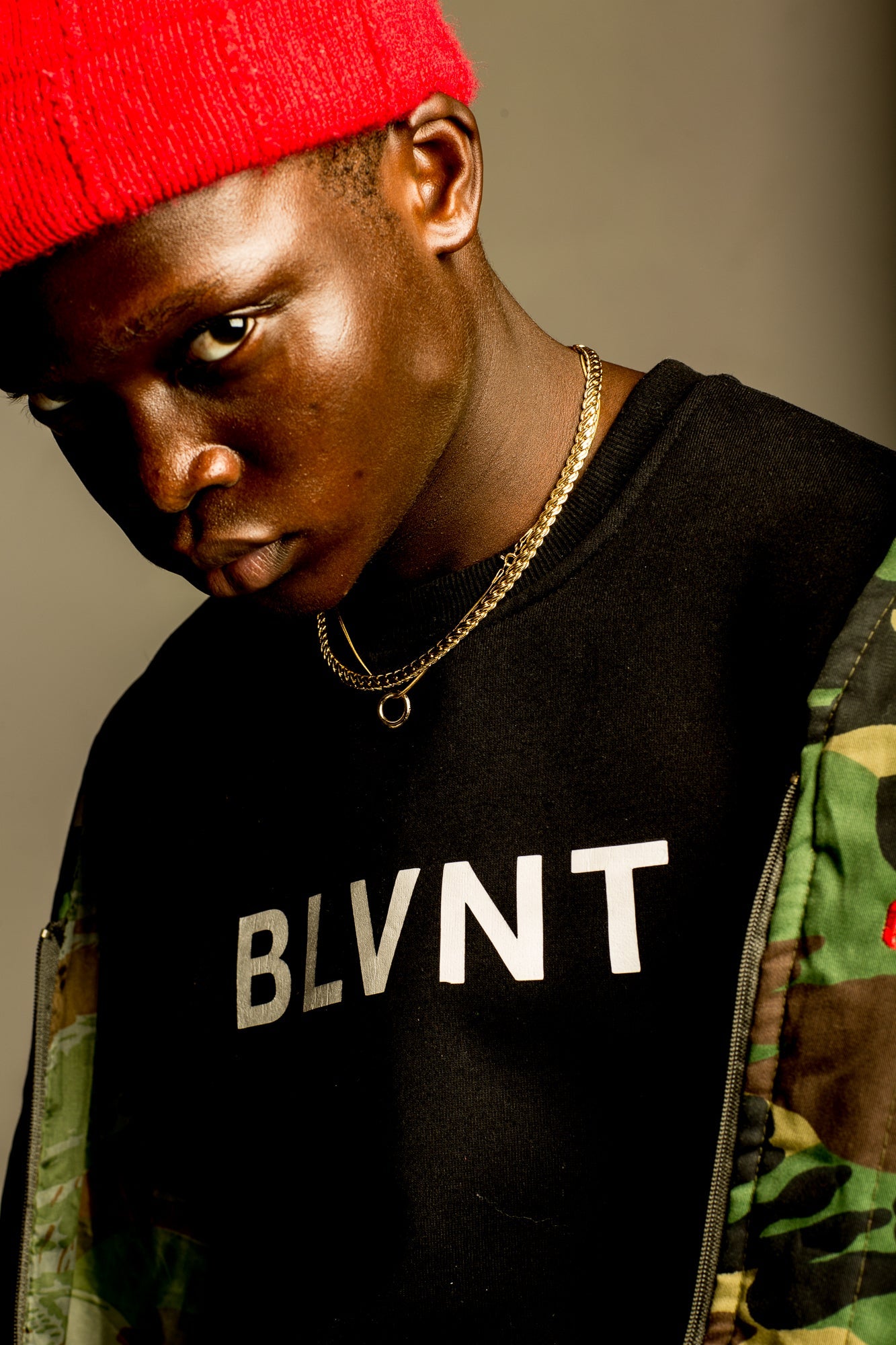 Male model wearing BLVNT sweatshirt