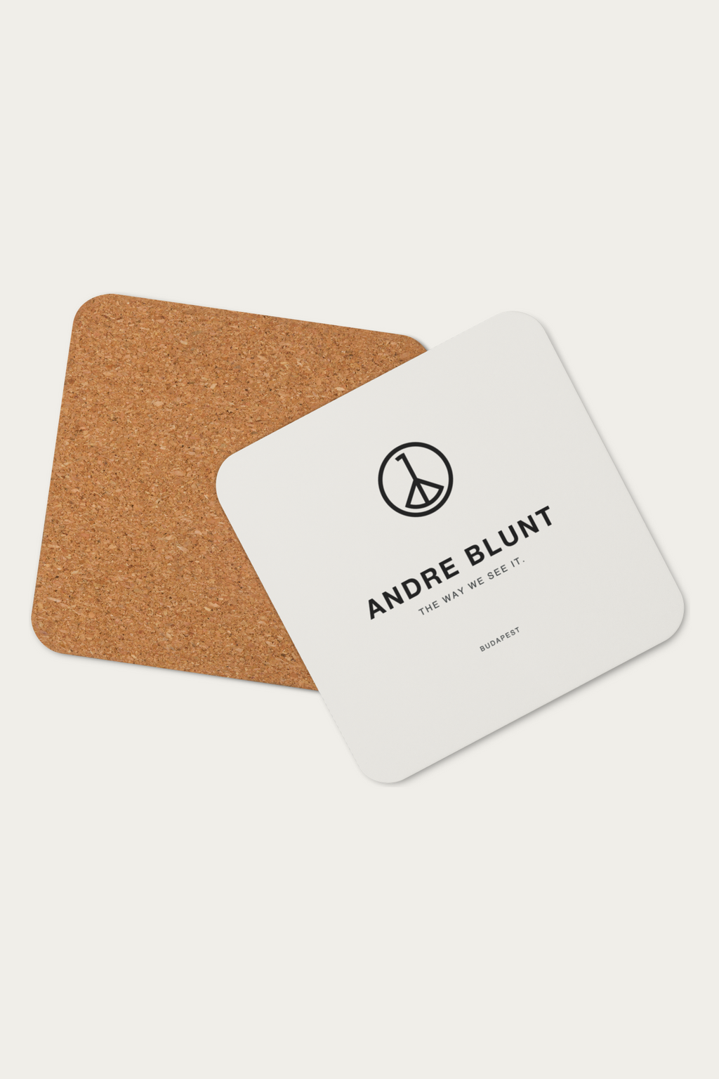 Cork Coaster, Natural by Andre Blunt, showing the cork back, on a Cloud White ground