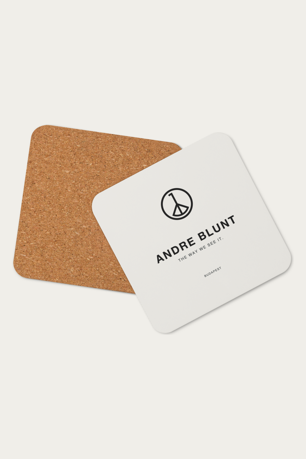 Cork Coaster, Natural by Andre Blunt, showing the cork back, on a Cloud White ground