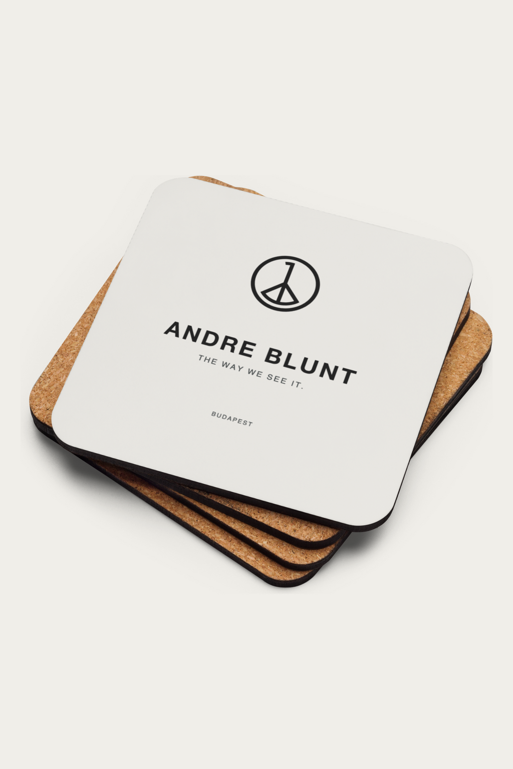 Cork Coaster, Natural by Andre Blunt, stacked, on a Cloud White ground