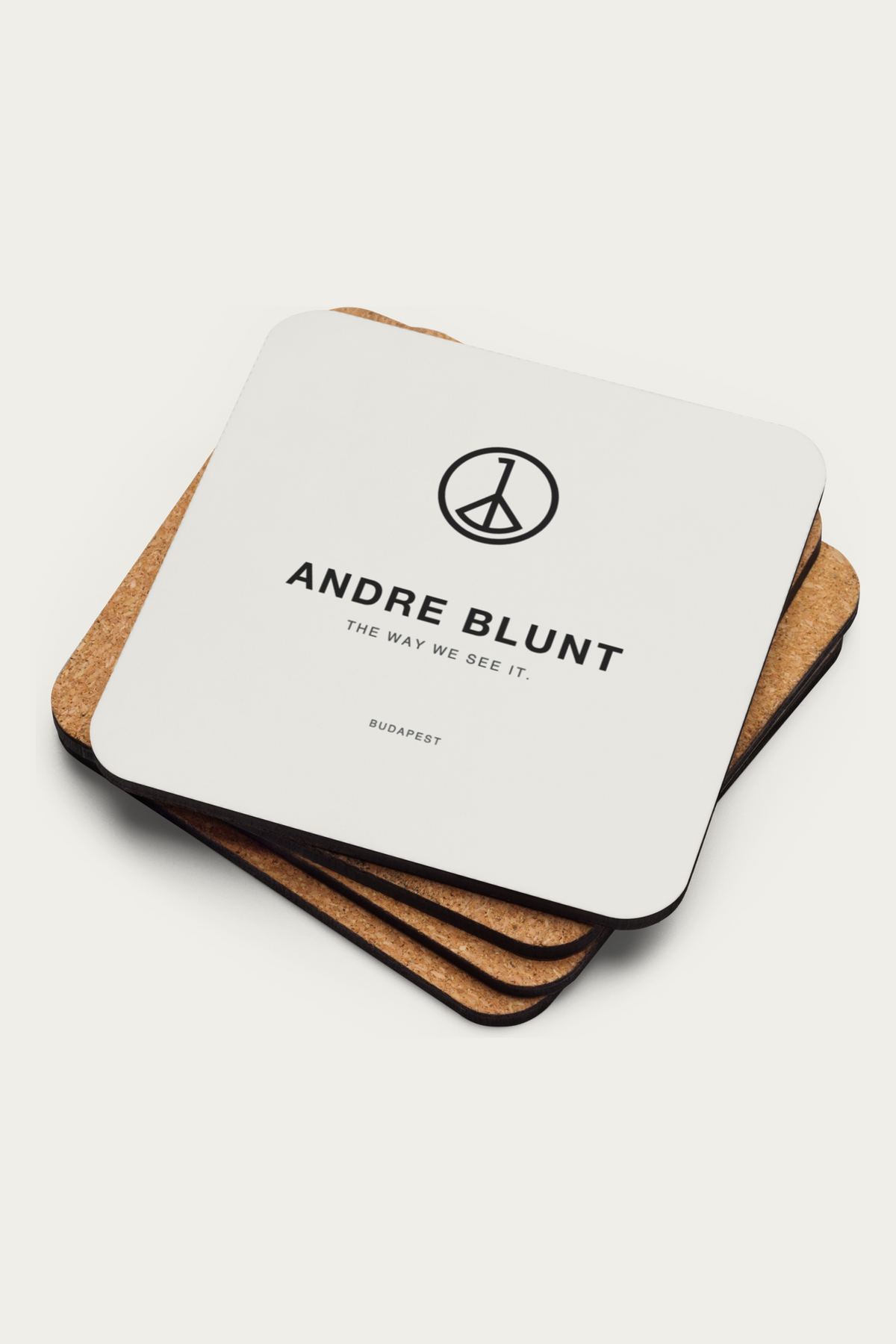Cork Coaster, Natural by Andre Blunt, stacked, on a Cloud White ground