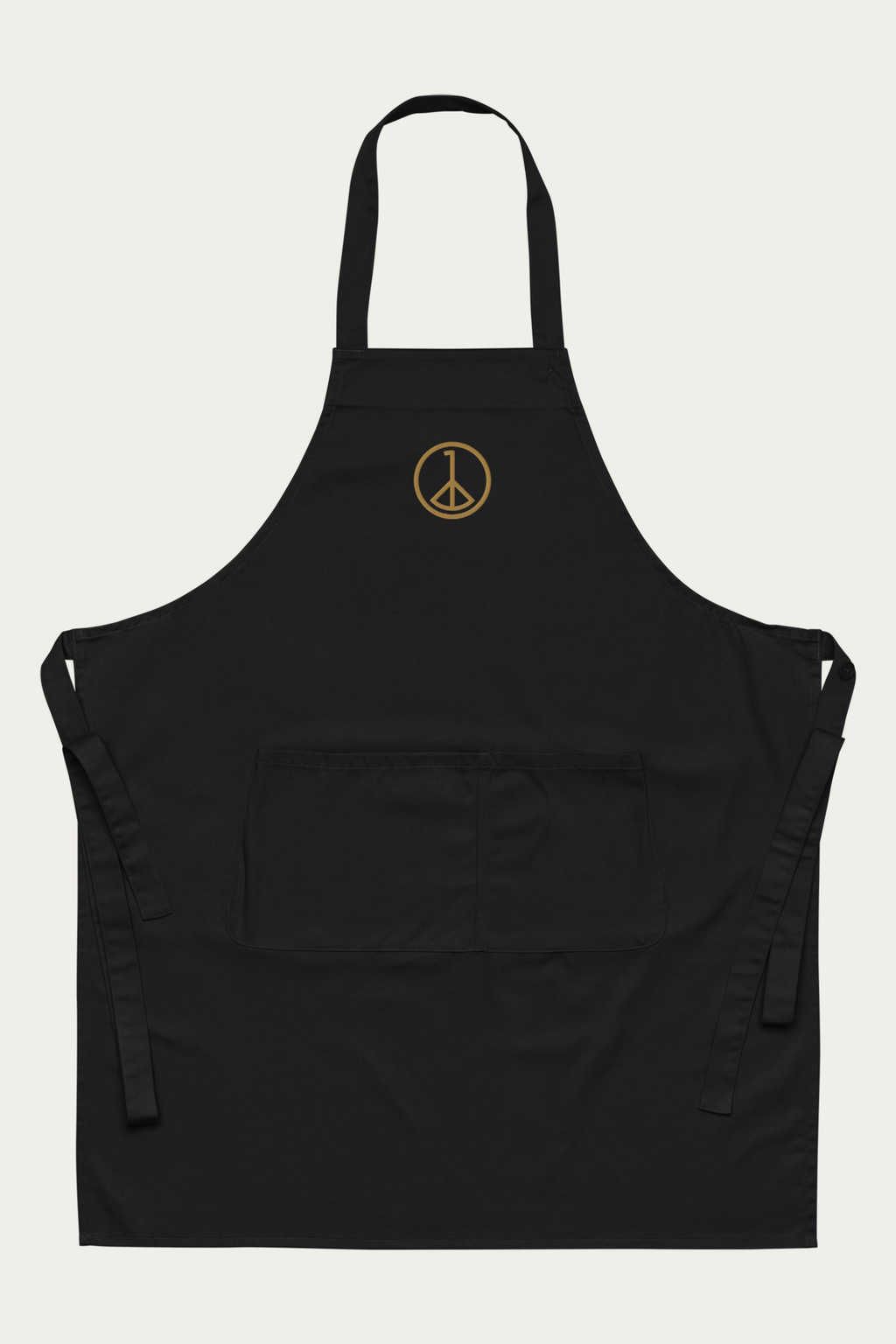 Cotton Apron in Black by Andre Blunt, shown on a Cloud White ground