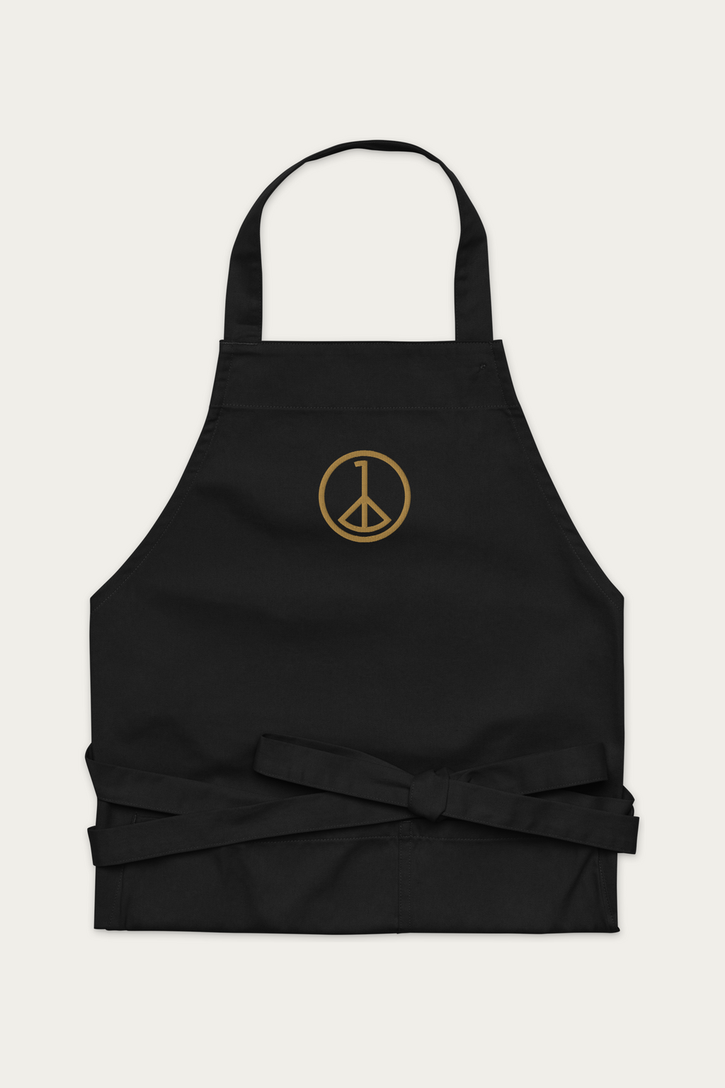 Cotton Apron, Black by Andre Blunt, shown on a Cloud White ground