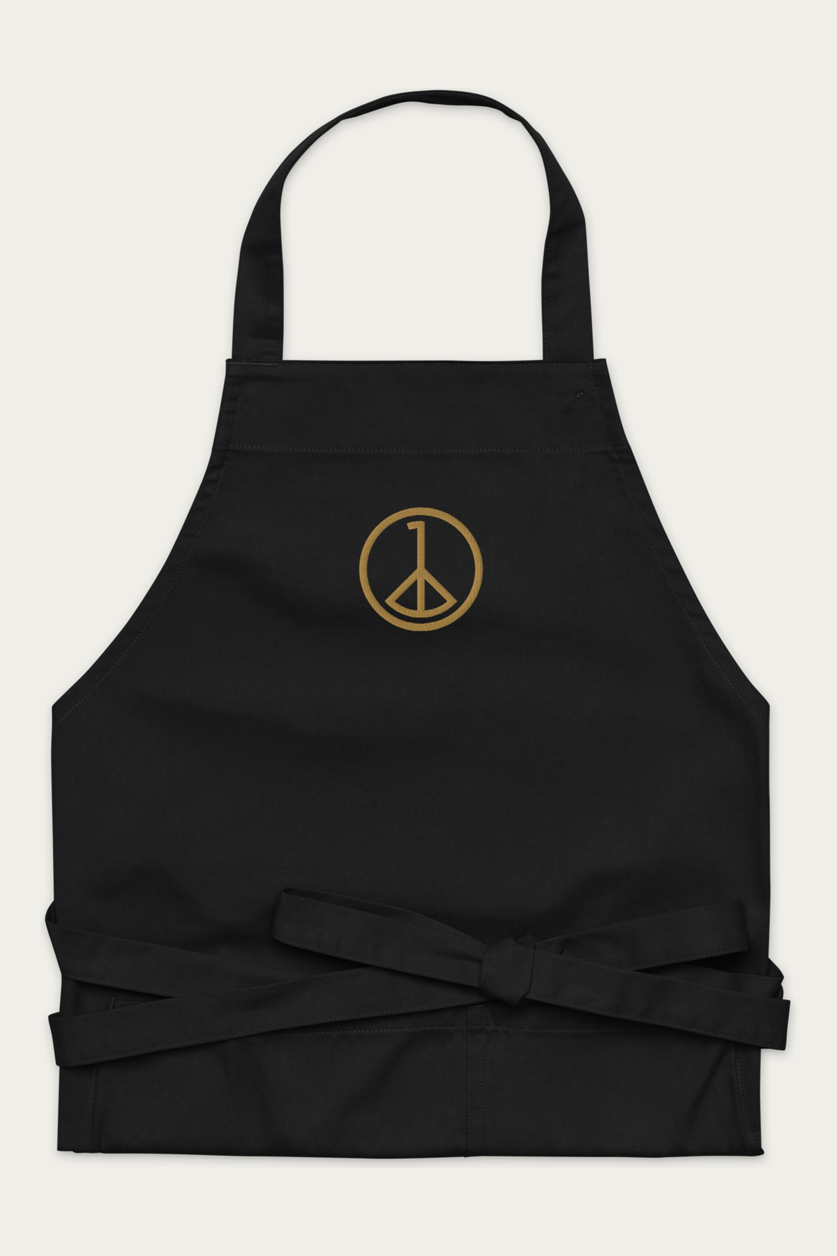 Cotton Apron, Black by Andre Blunt, shown on a Cloud White ground