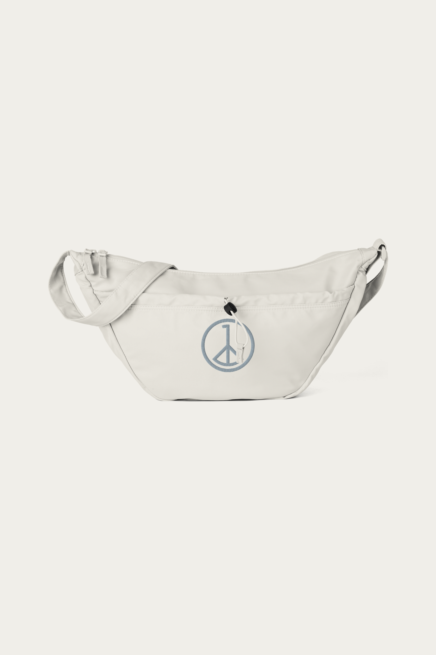 Crossbody Bag, Natural by Andre Blunt, shown on a Cloud White ground
