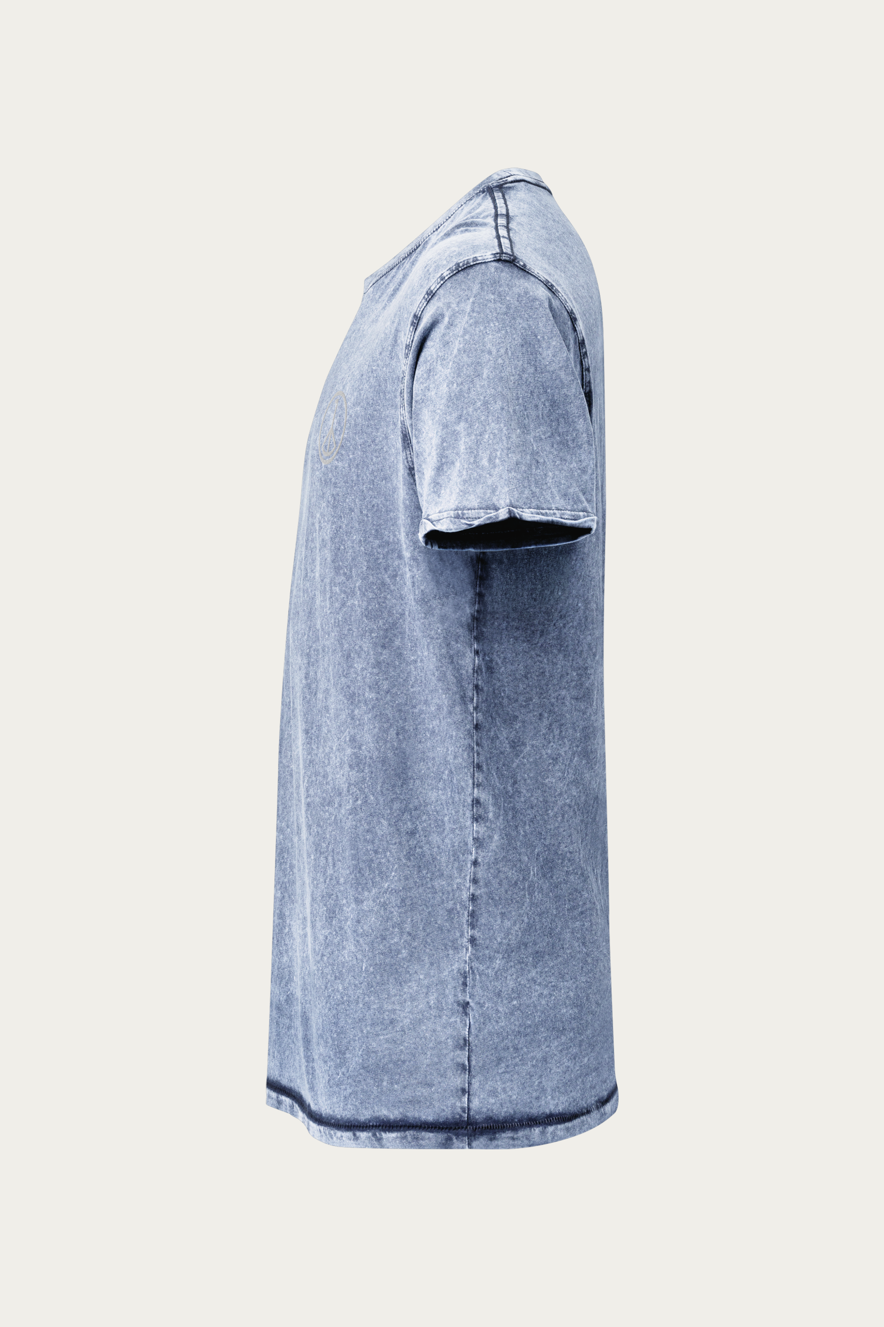 Denim Tee, Indigo by Andre Blunt, left, on a Cloud White ground