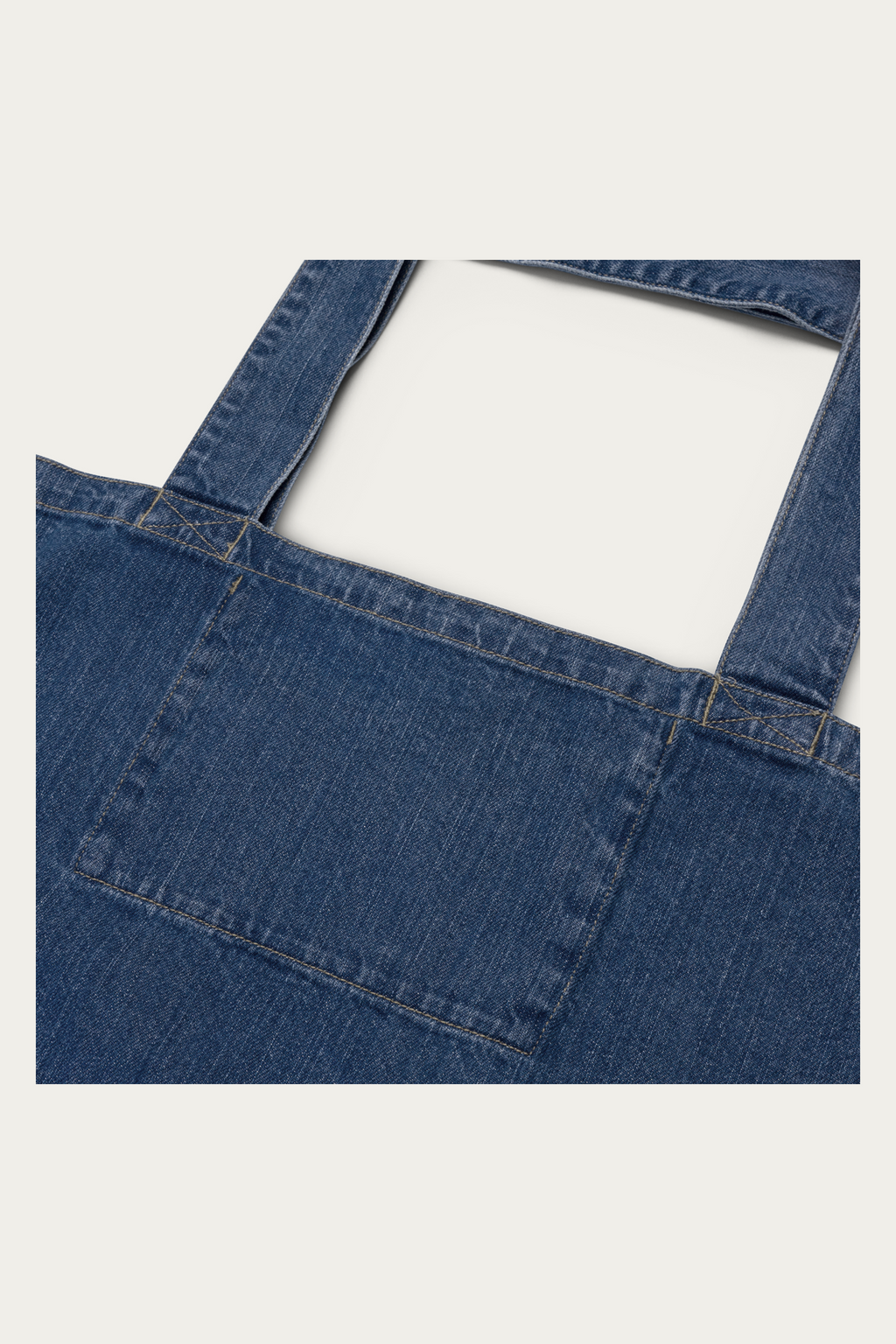 Denim Tote Bag by Andre Blunt, detail, on a Cloud White ground