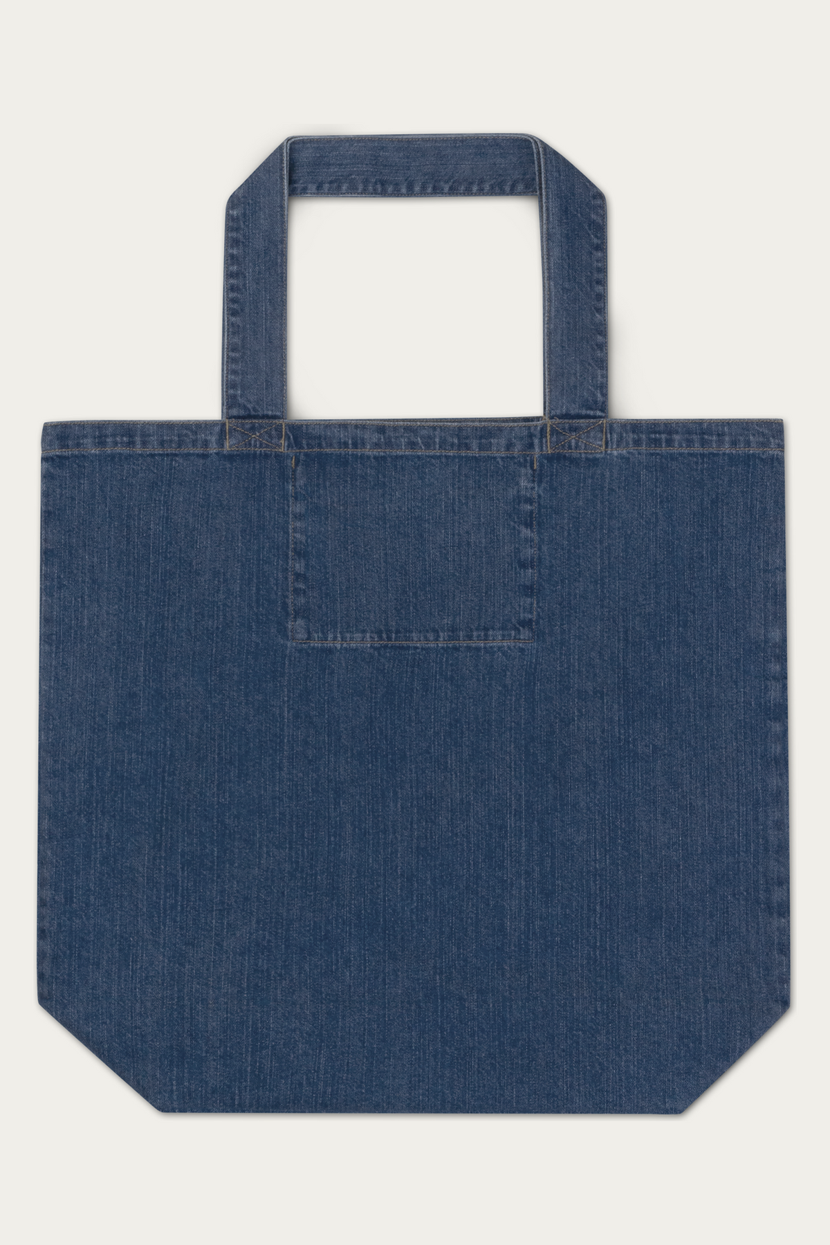 Denim Tote Bag by Andre Blunt, from the back, on a Cloud White ground