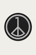 Embroidered Patch, Black by Andre Blunt, shown on a Cloud White ground