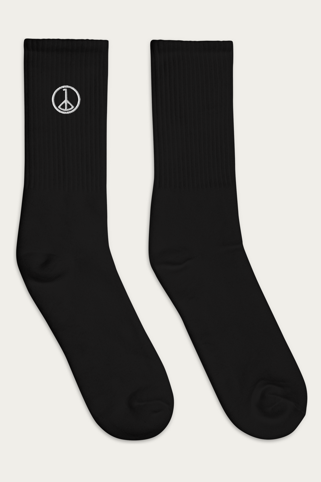 Embroidered Socks, Black by Andre Blunt, from the right, on a Cloud White ground