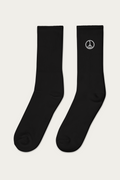 Embroidered Socks, Black by Andre Blunt, from the left, on a Cloud White ground