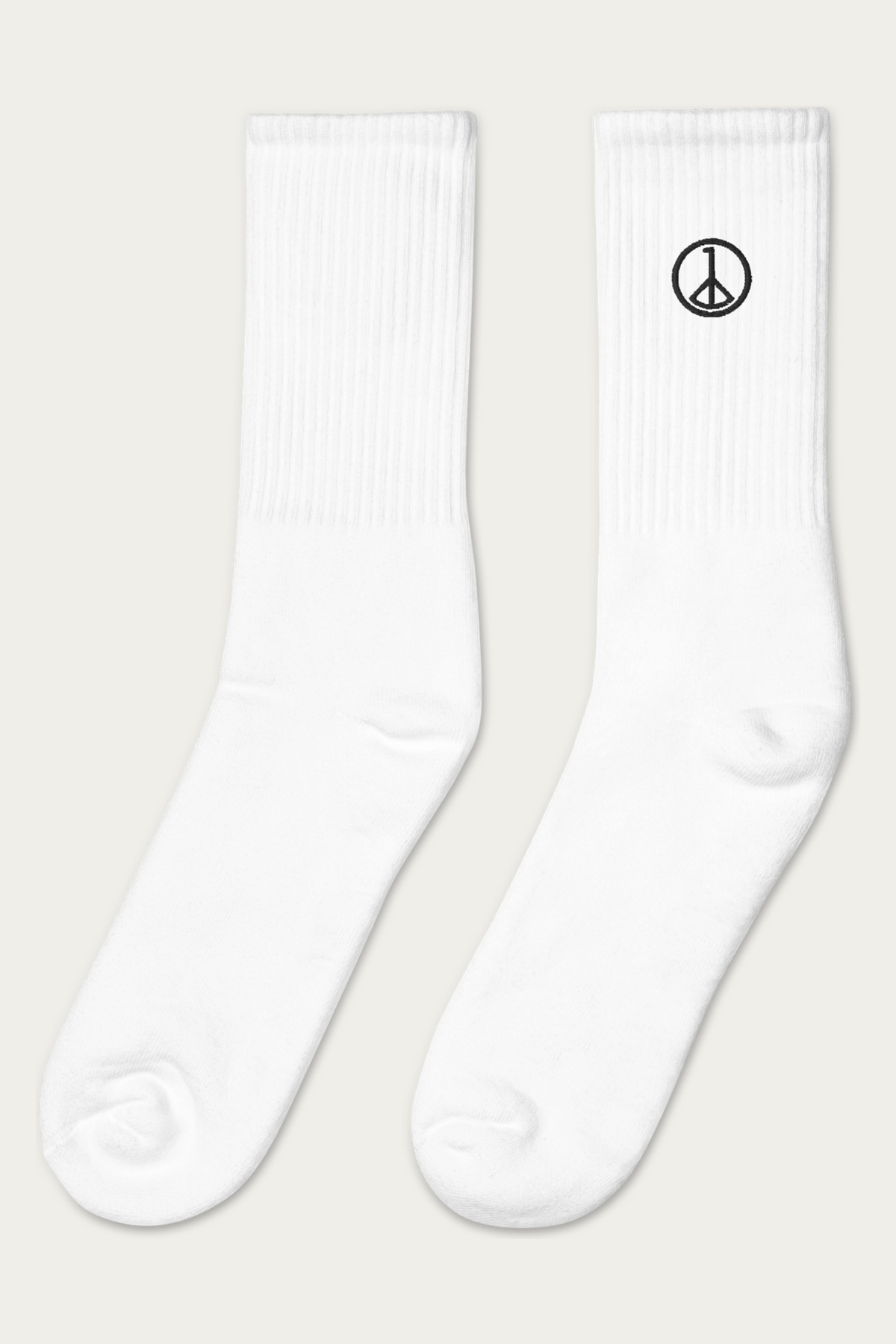 Embroidered Socks, White by Andre Blunt, from the left, on a Cloud White ground