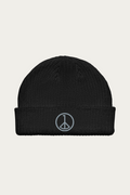 Fisherman Beanie in Black by Andre Blunt, shown on a Cloud White ground