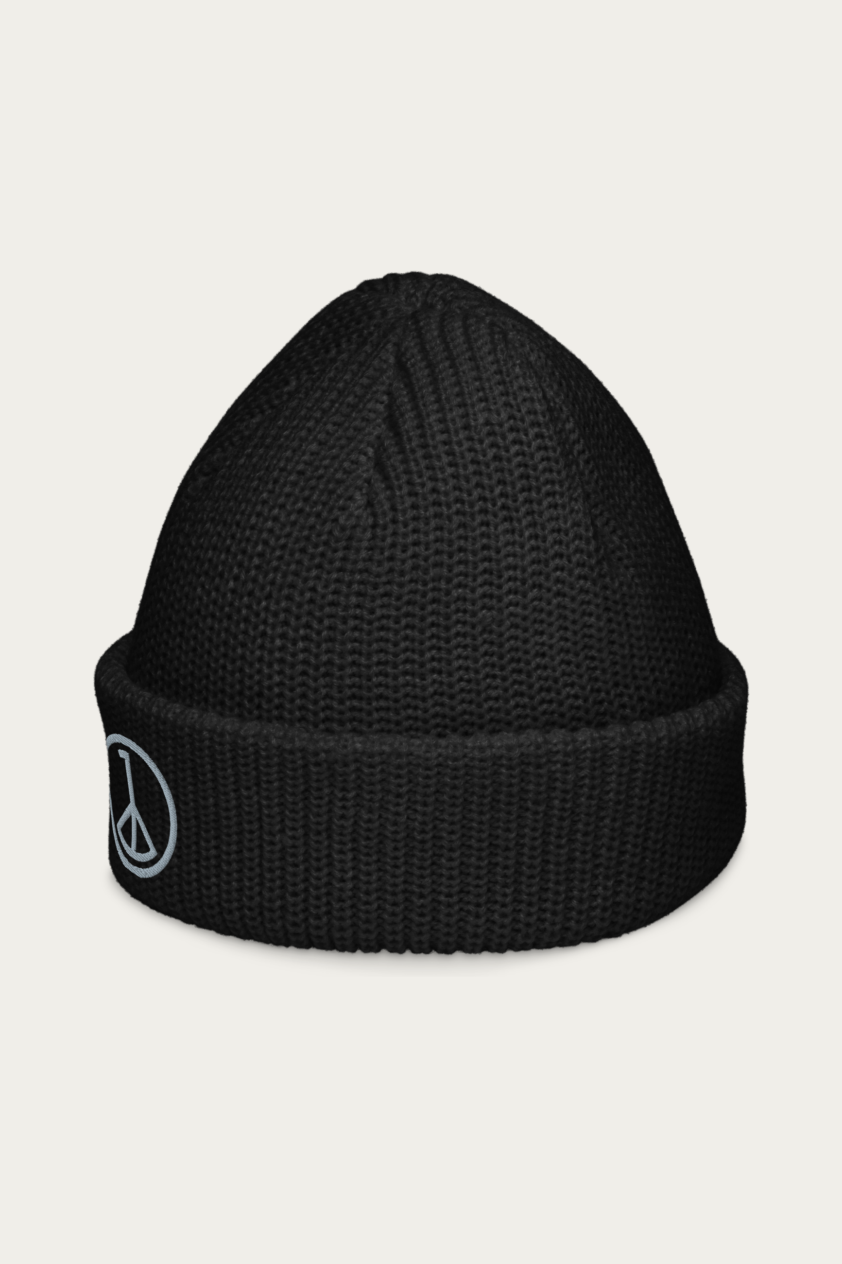 Fisherman Beanie in Black by Andre Blunt, from the left, on a Cloud White ground