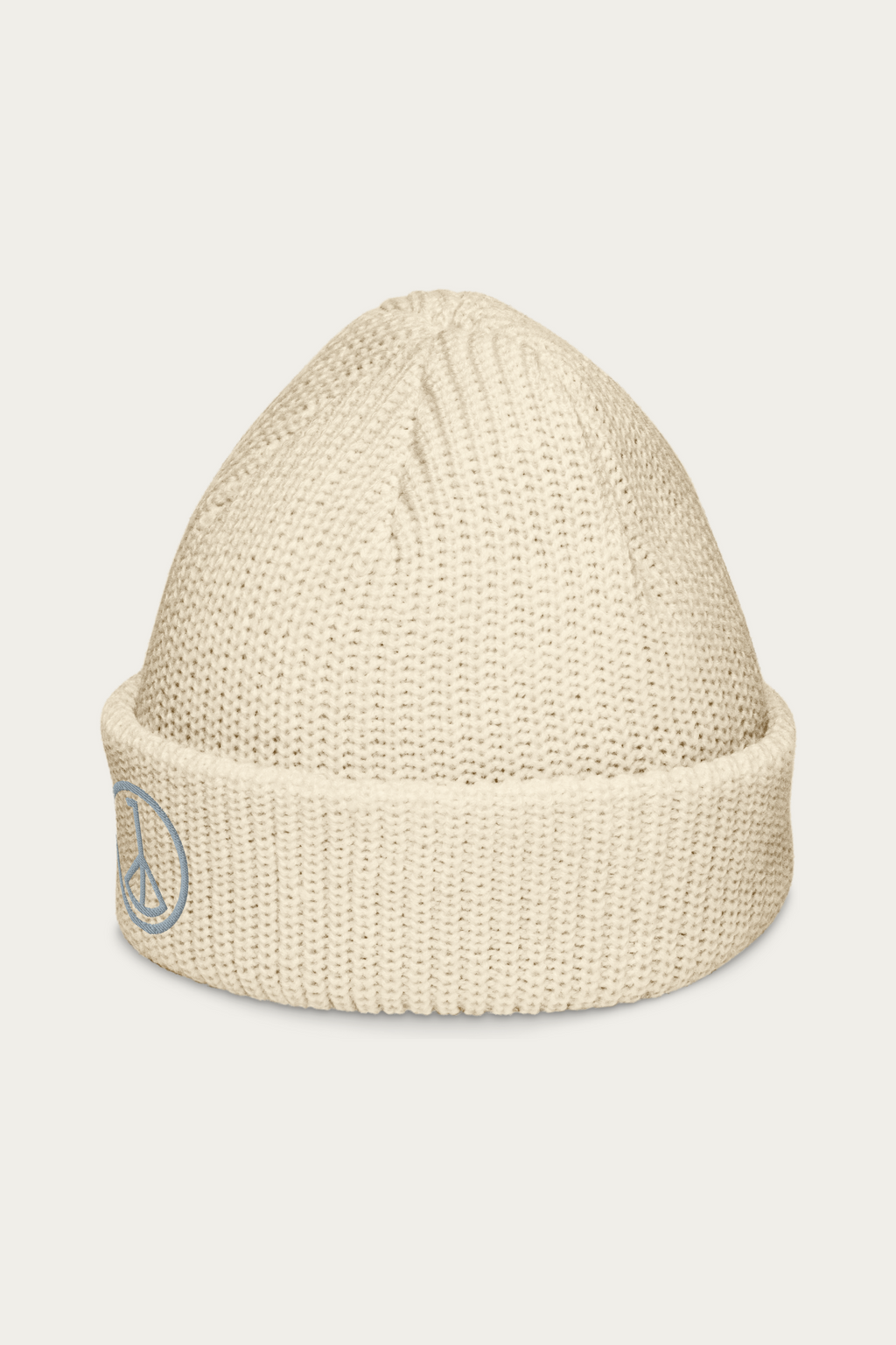Fisherman Beanie, Ecru by Andre Blunt, from the left, on a Cloud White ground