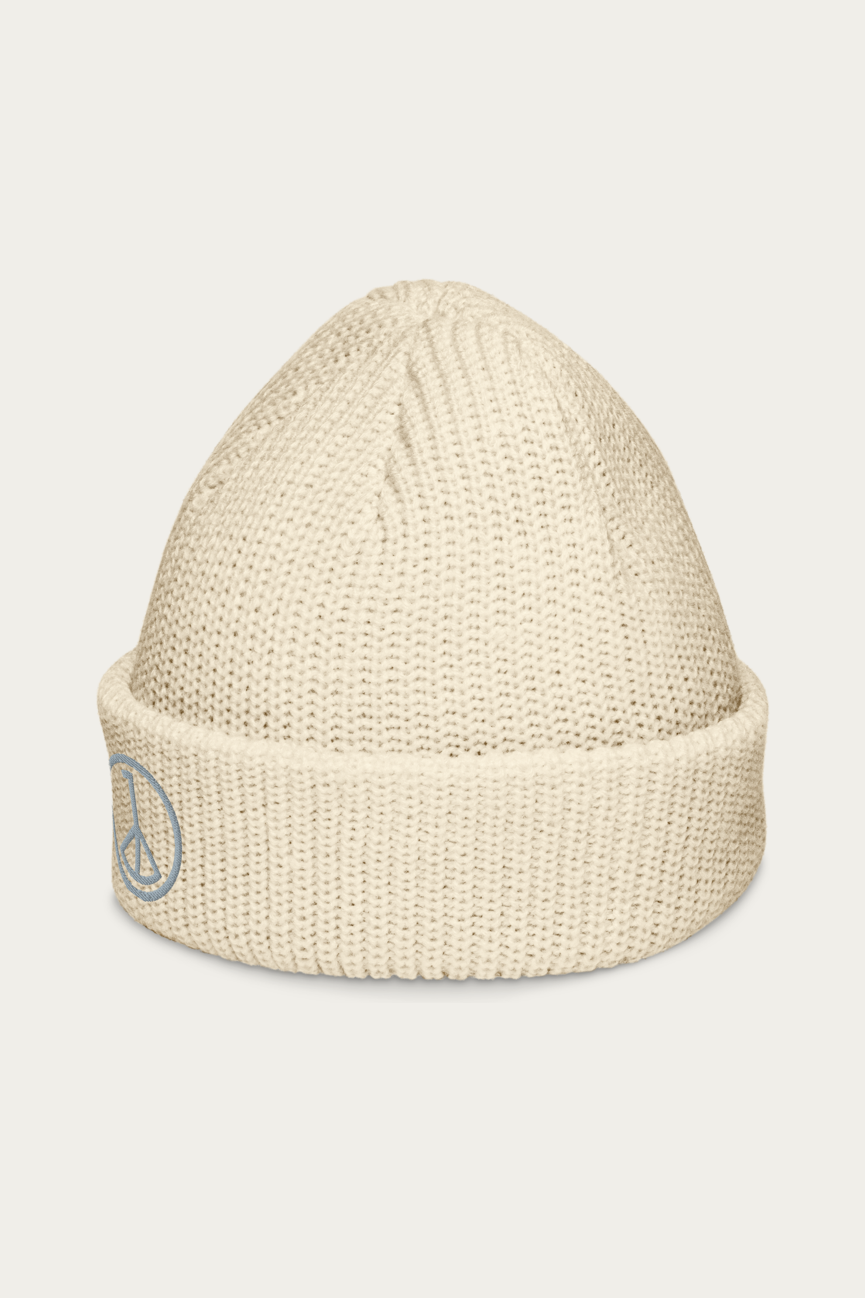 Fisherman Beanie, Ecru by Andre Blunt, from the left, on a Cloud White ground