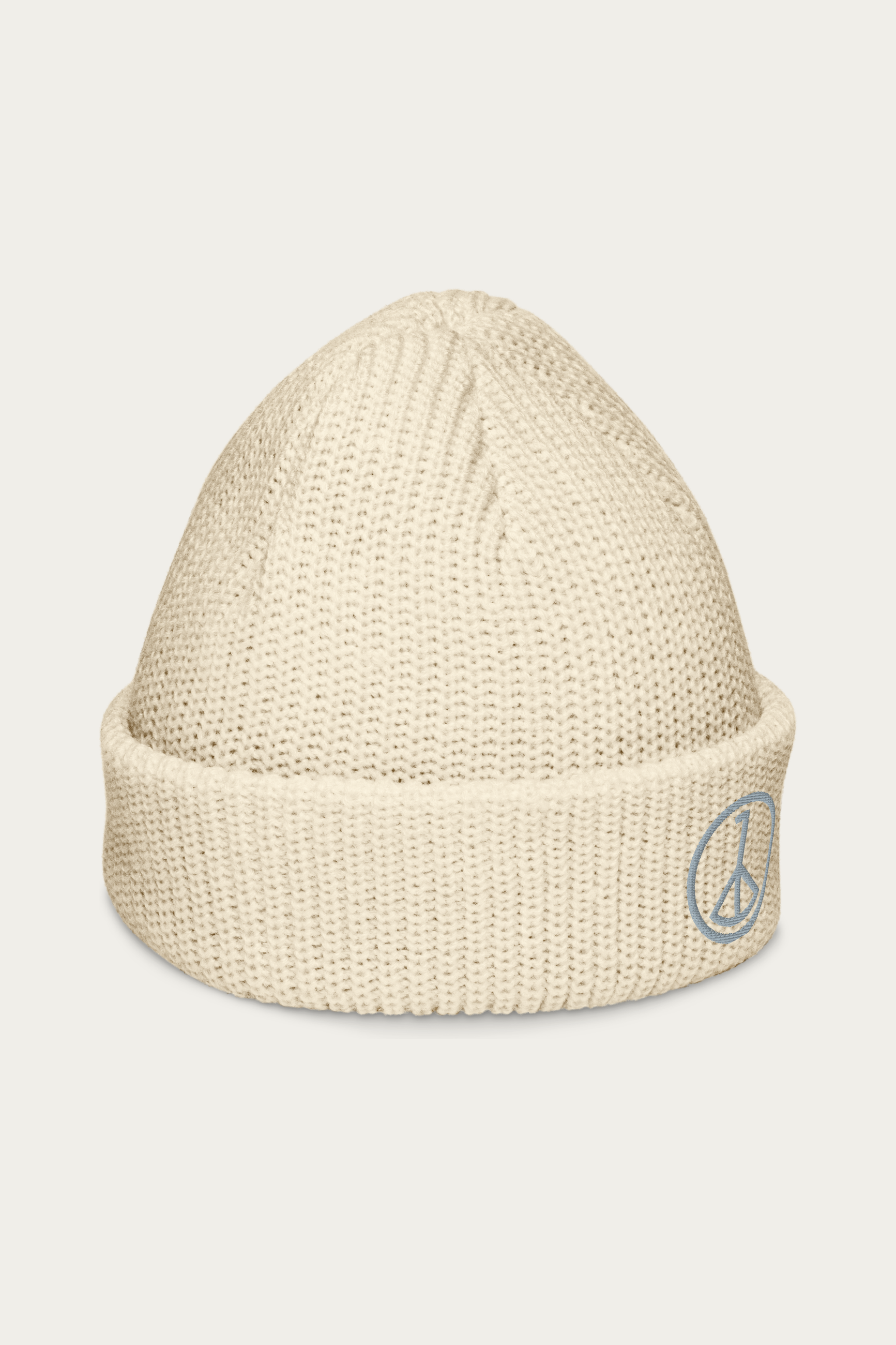 Fisherman Beanie, Ecru by Andre Blunt, from the right, on a Cloud White ground