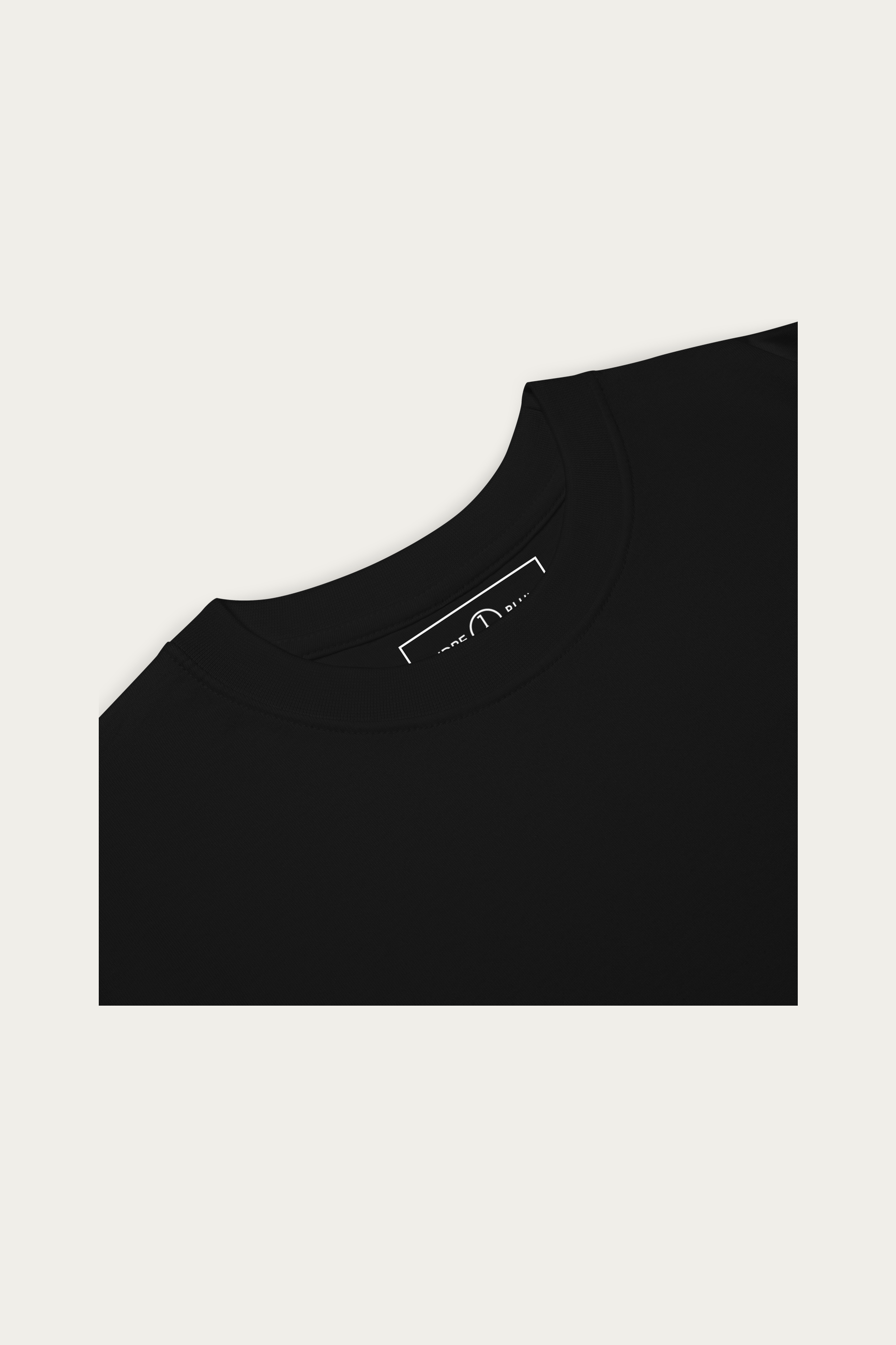 Heavyweight Tee, Black by Andre Blunt, detail, on a Cloud White ground