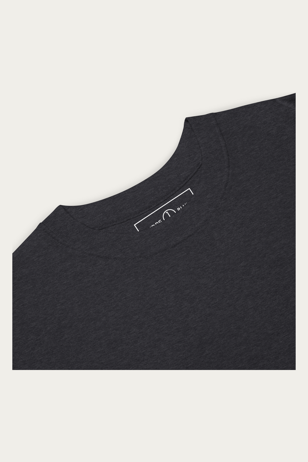 Heavyweight Tee, Charcoal by Andre Blunt, detail, on a Cloud White ground