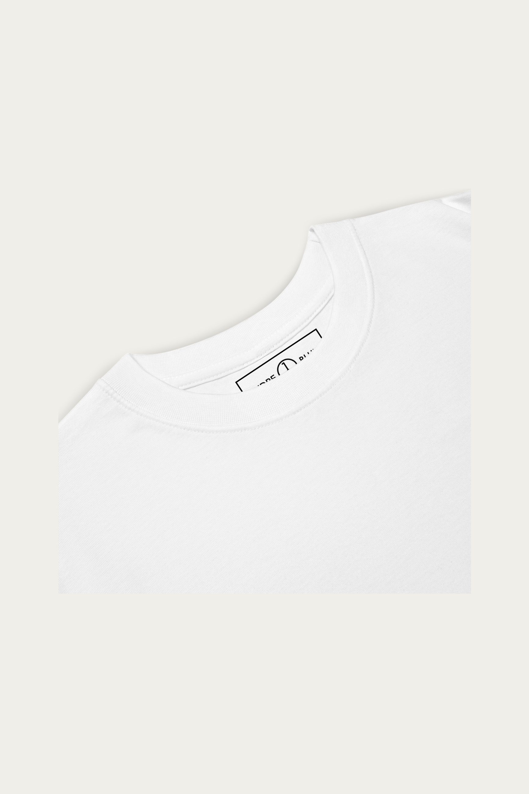 Heavyweight Tee, White by Andre Blunt, detail, on a Cloud White ground