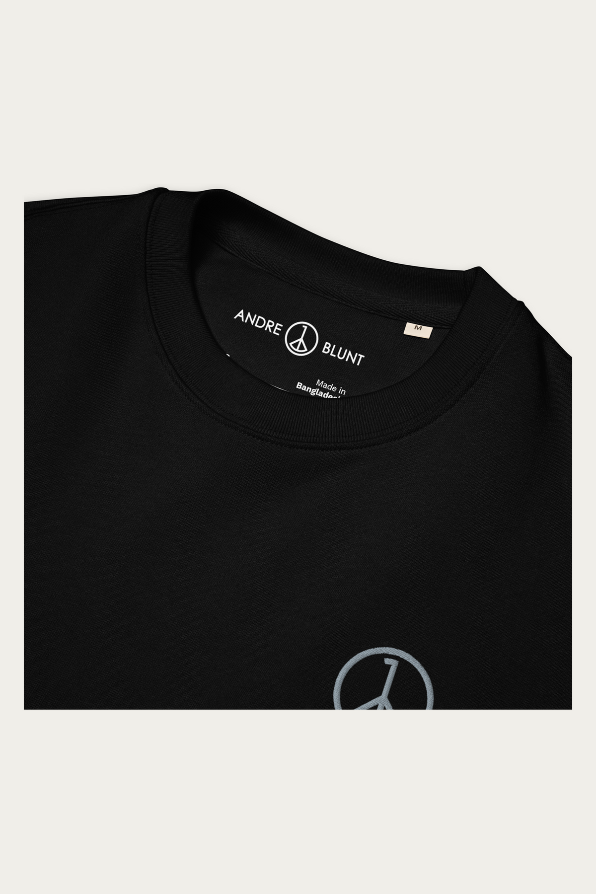 Organic Cotton Sweatshirt, Black by Andre Blunt, detail, on a Cloud White ground