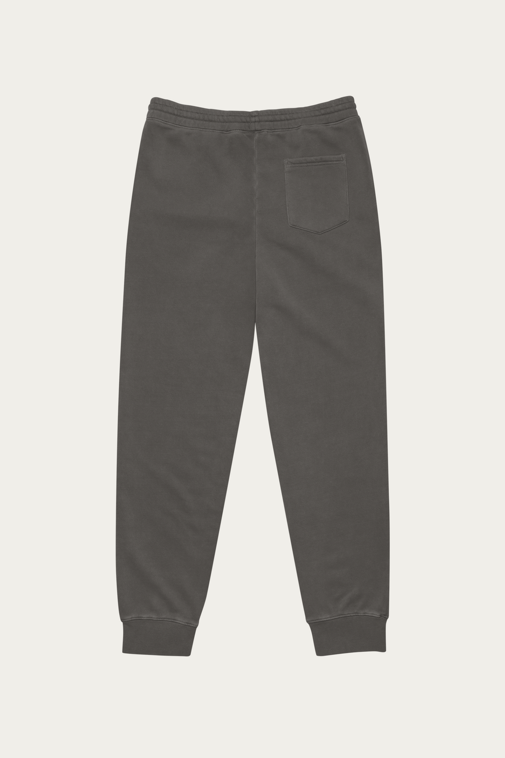 Pigment-Dyed Sweatpants, Black by Andre Blunt, from the back, on a Cloud White ground