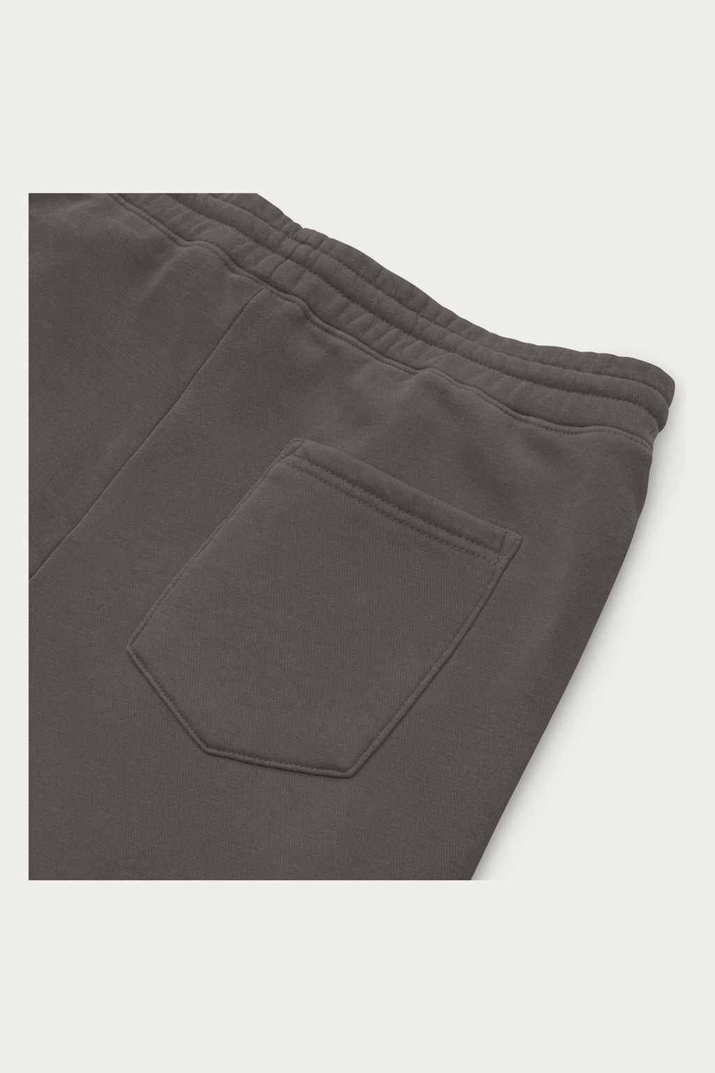 Pigment-Dyed Sweatpants, Black by Andre Blunt, detail, on a Cloud White ground