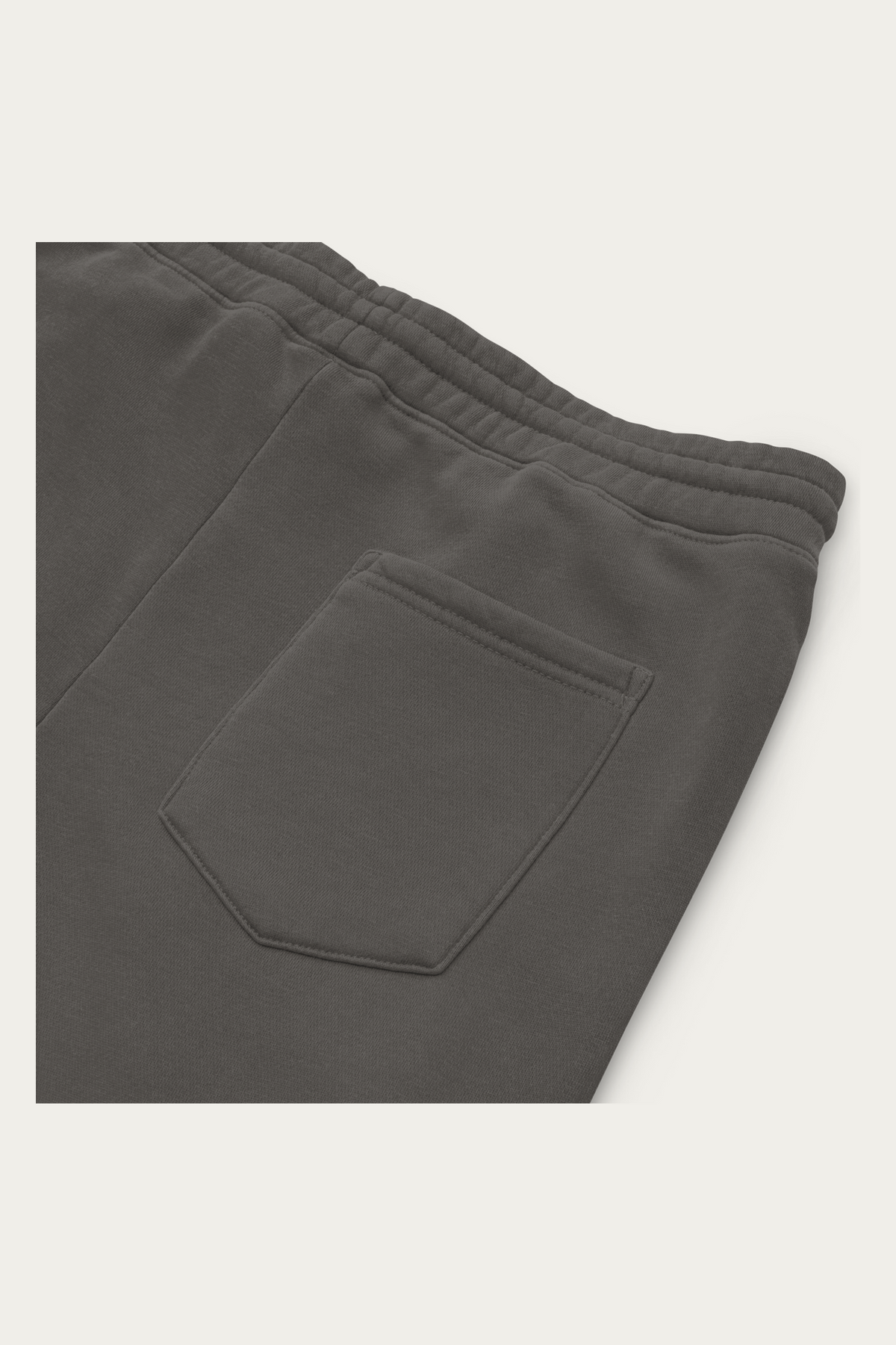 Pigment-Dyed Sweatpants, Black by Andre Blunt, detail, on a Cloud White ground