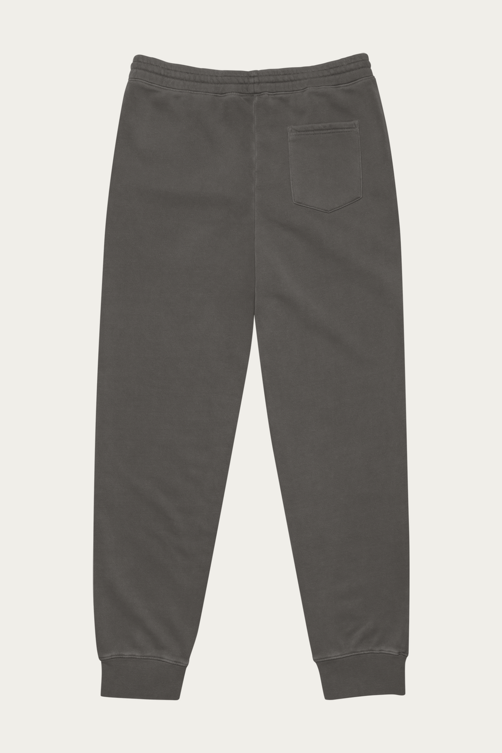Pigment-Dyed Sweatpants, Black by Andre Blunt, from the back, on a Cloud White ground