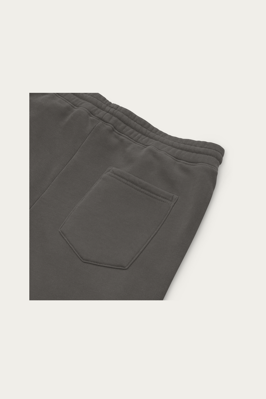 Pigment-Dyed Sweatpants, Black by Andre Blunt, detail, on a Cloud White ground