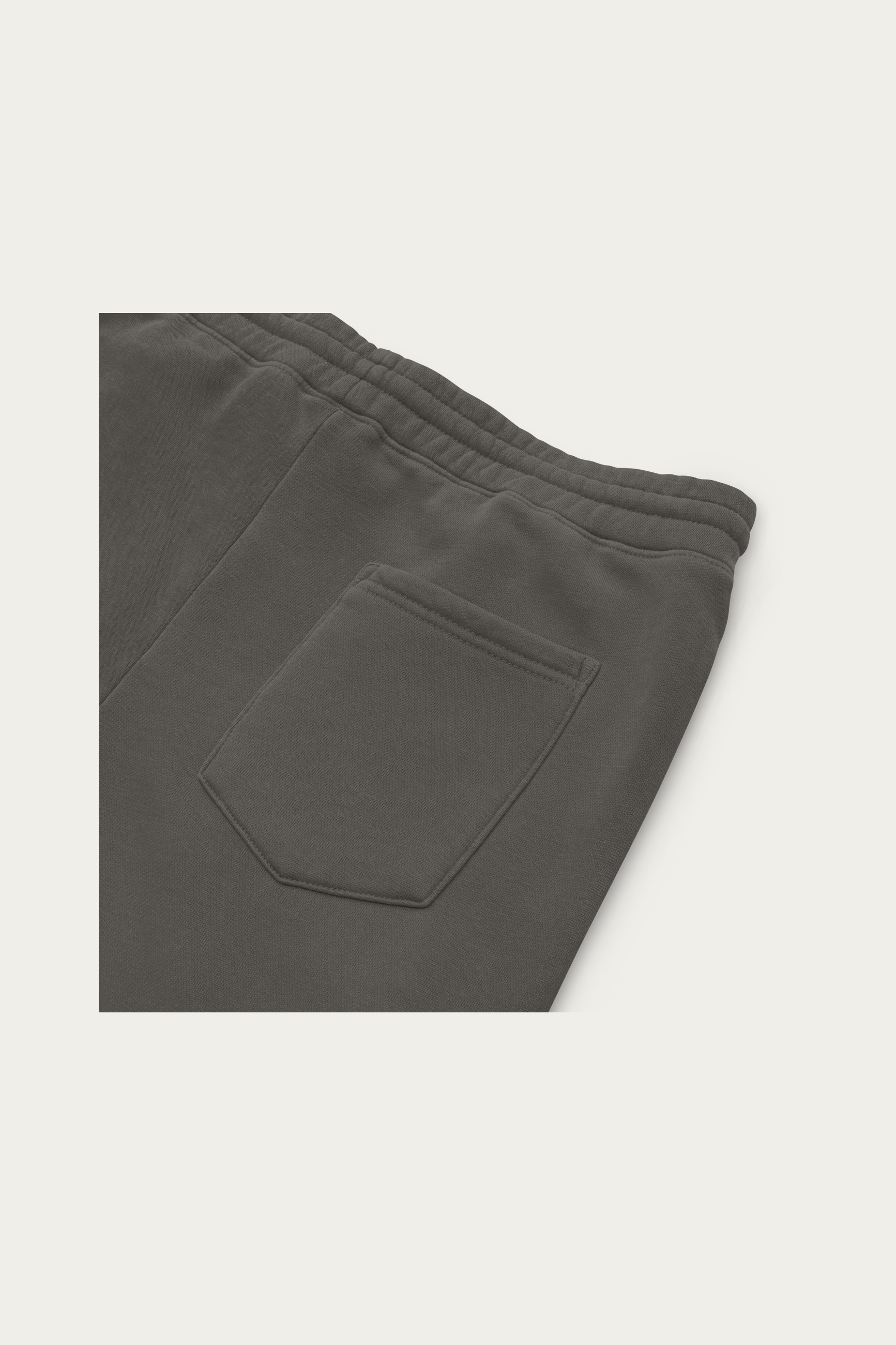 Pigment-Dyed Sweatpants, Black by Andre Blunt, detail, on a Cloud White ground