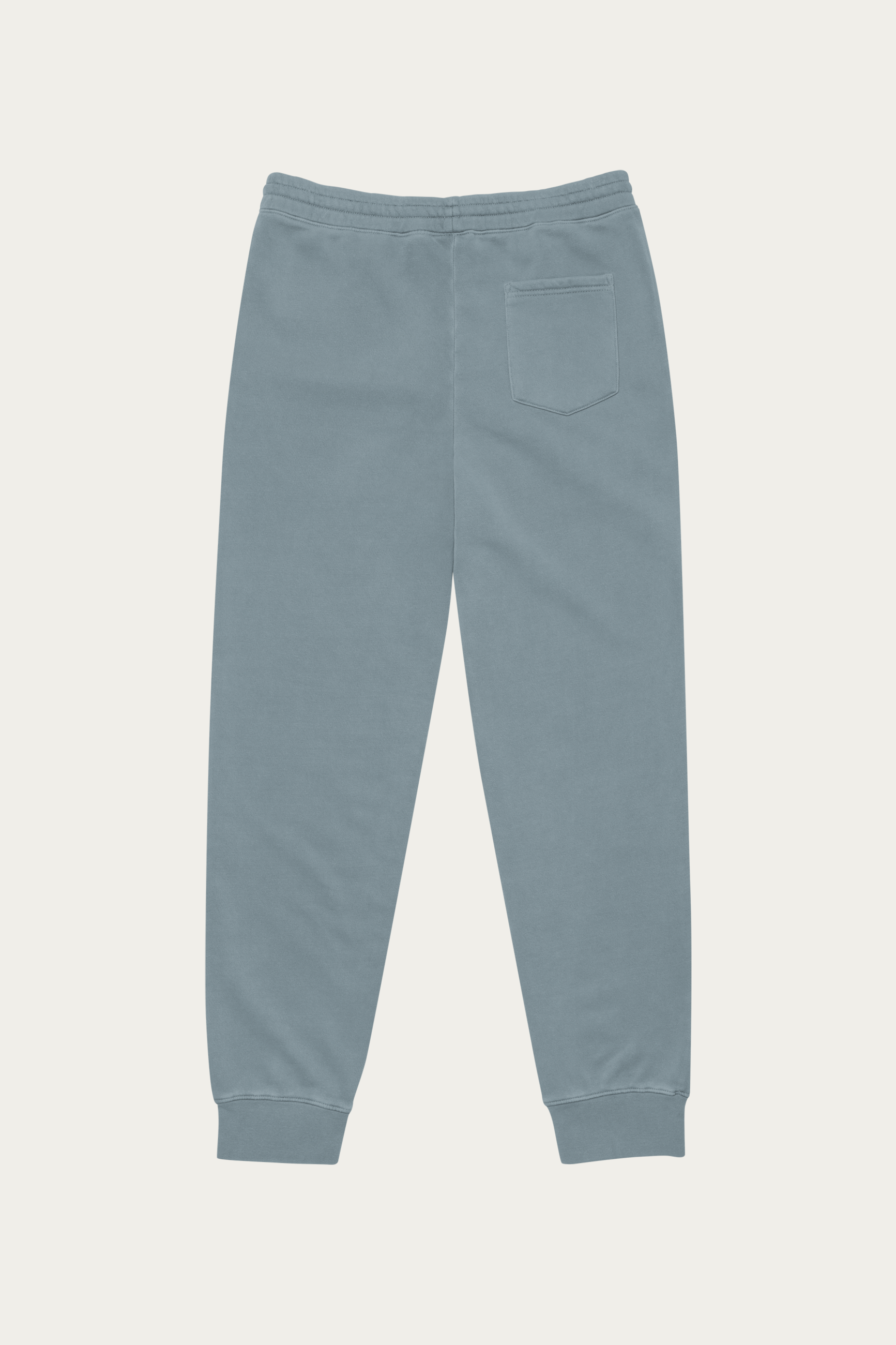 Pigment-Dyed Sweatpants, Slate by Andre Blunt, from the back, on a Cloud White ground