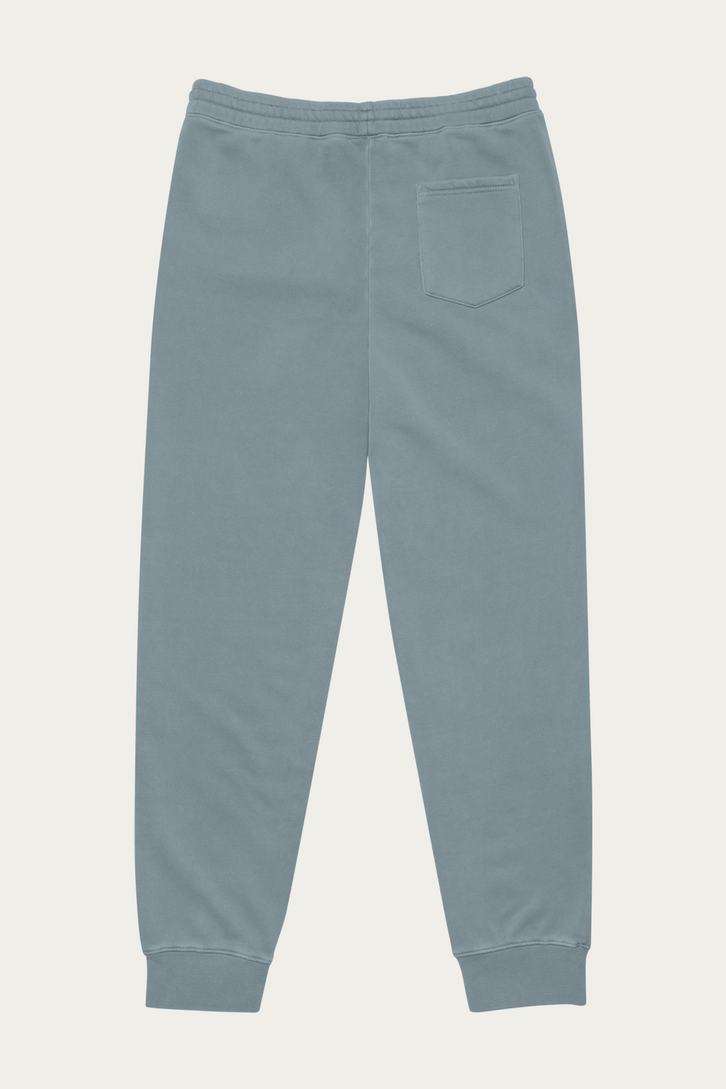 Pigment-Dyed Sweatpants, Slate by Andre Blunt, from the back, on a Cloud White ground