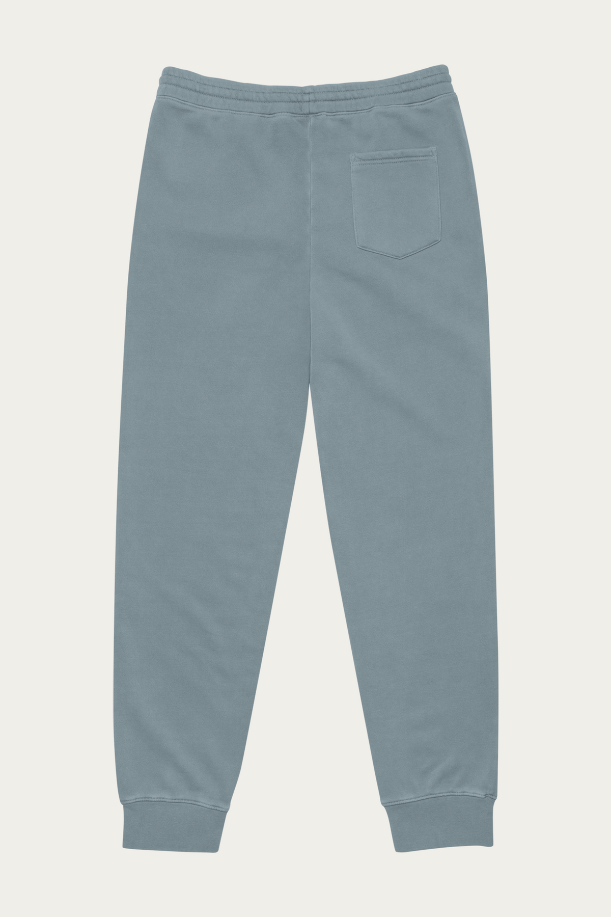 Pigment-Dyed Sweatpants, Slate by Andre Blunt, from the back, on a Cloud White ground