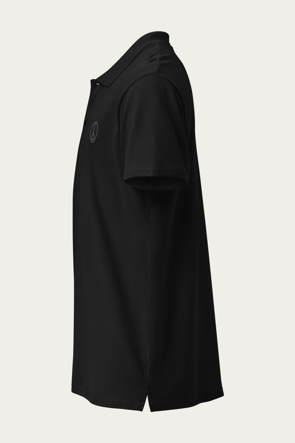 Piqué Polo, Black by Andre Blunt, left, on a Cloud White ground