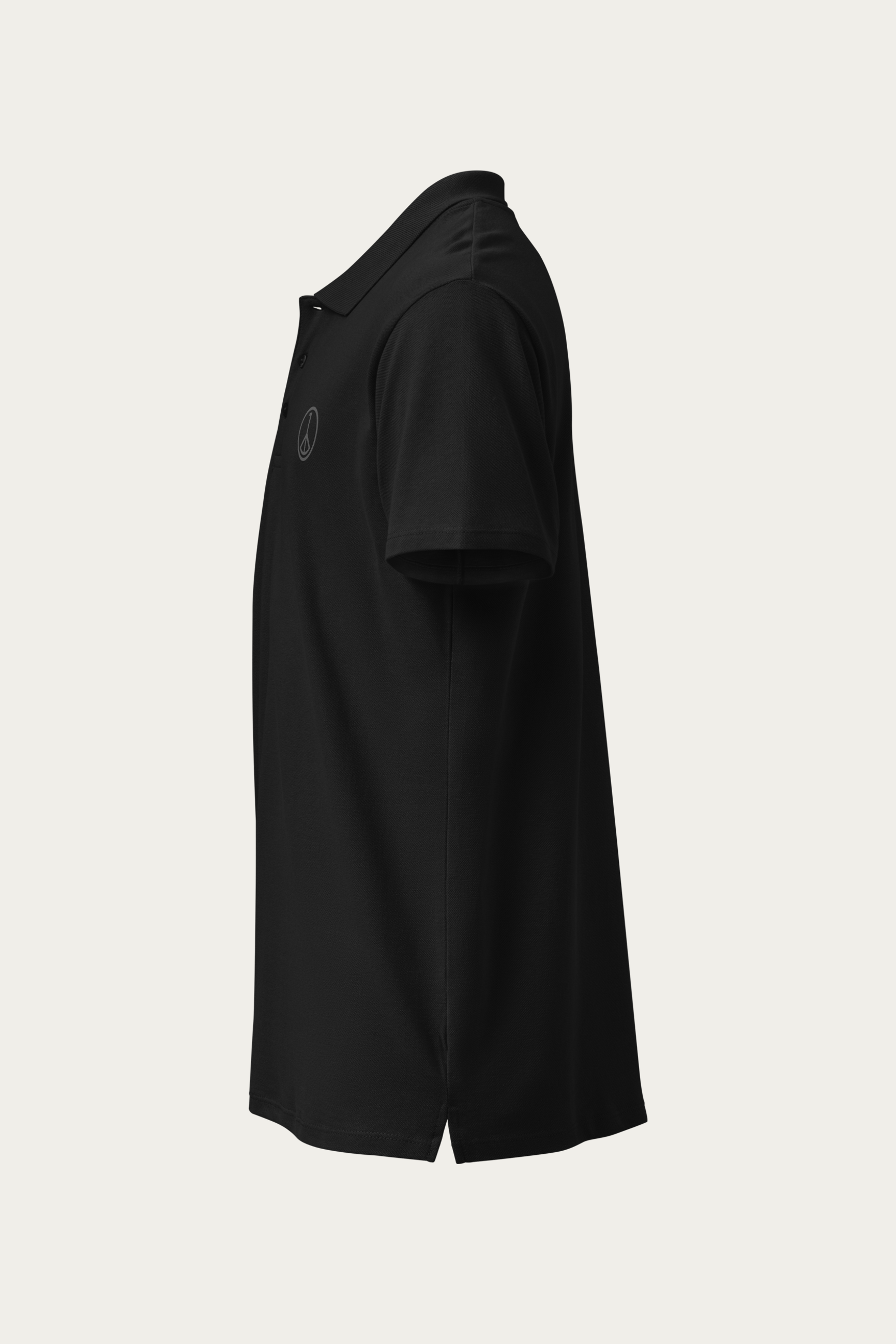 Piqué Polo, Black by Andre Blunt, left, on a Cloud White ground