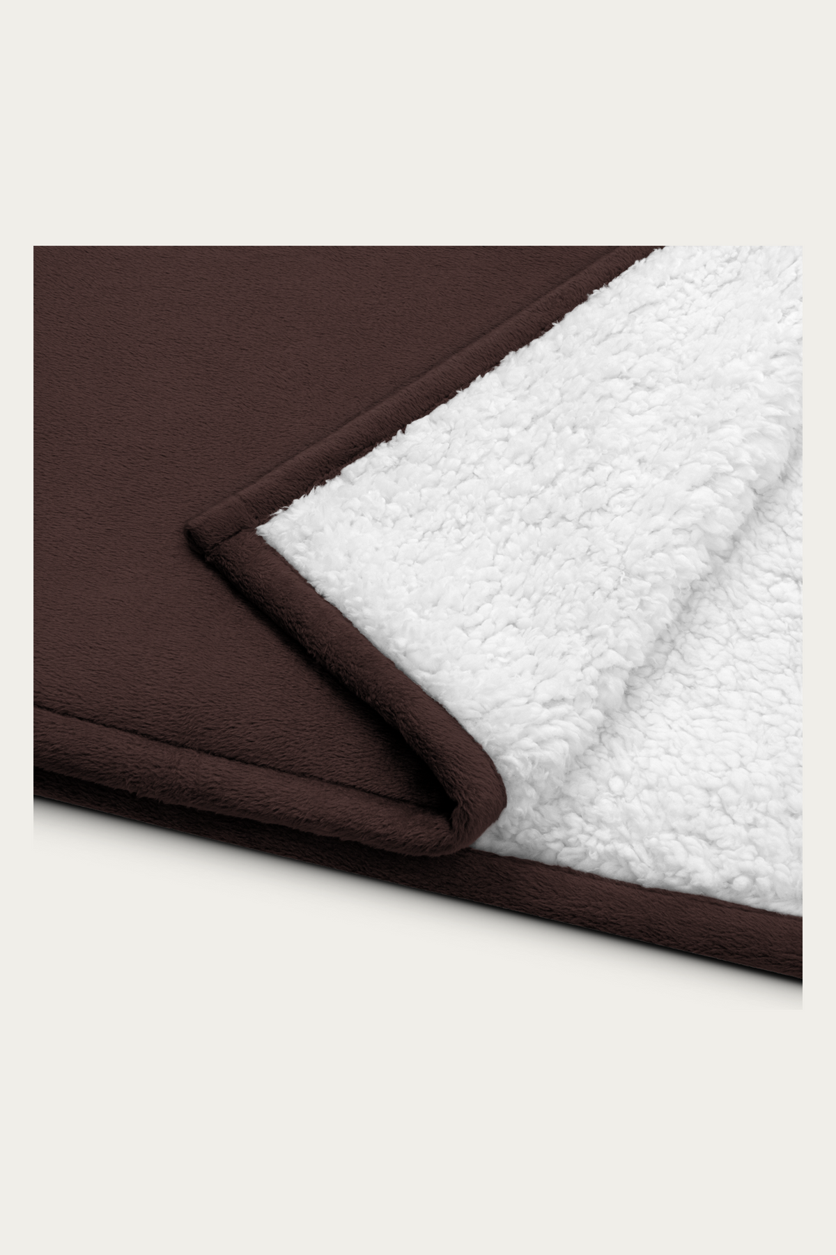 Sherpa Blanket, Brown by Andre Blunt, folded corner showing the sherpa reverse, on a Cloud White ground