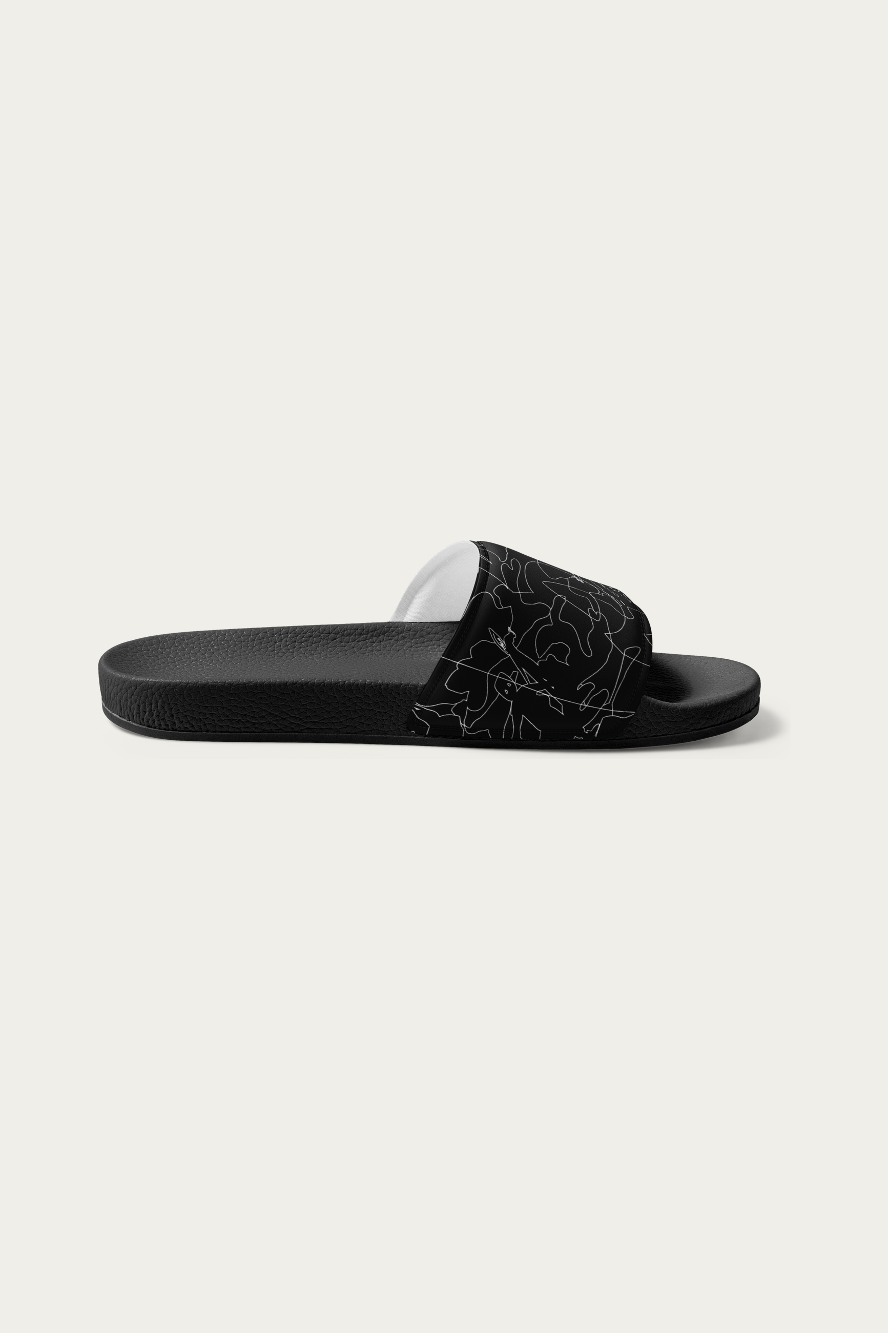Slides, Black by Andre Blunt, inner side, on a Cloud White ground