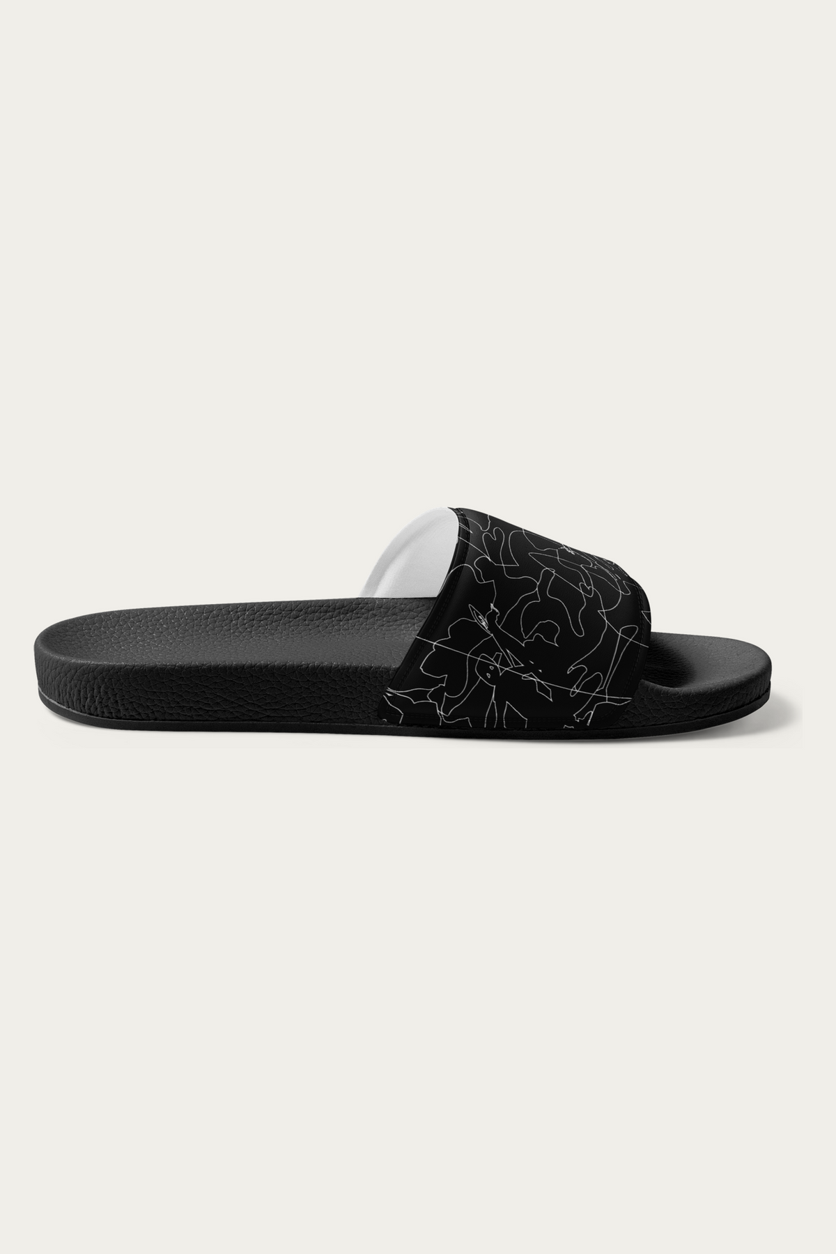 Slides, Black by Andre Blunt, inner side, on a Cloud White ground