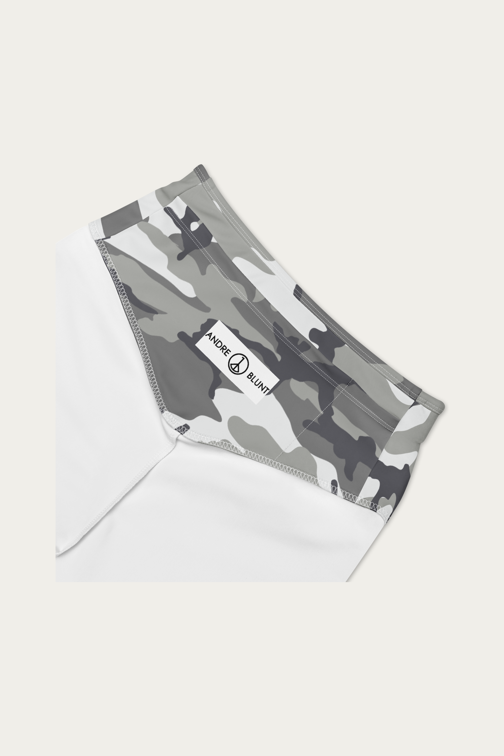 Snow Camo Biker Shorts by Andre Blunt, detail, on a Cloud White ground