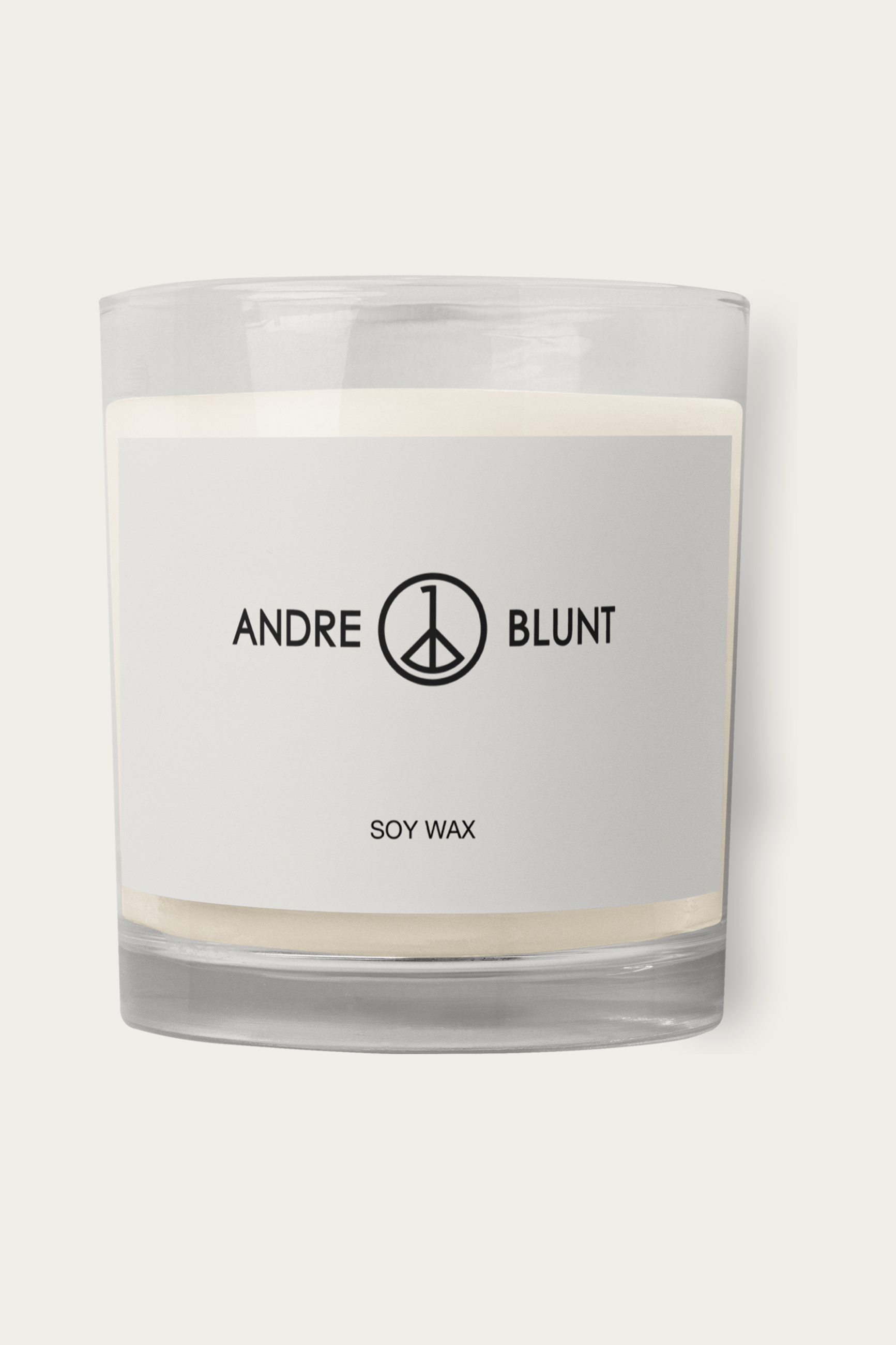 Soy Candle, Glass Jar by Andre Blunt, shown on a Cloud White ground