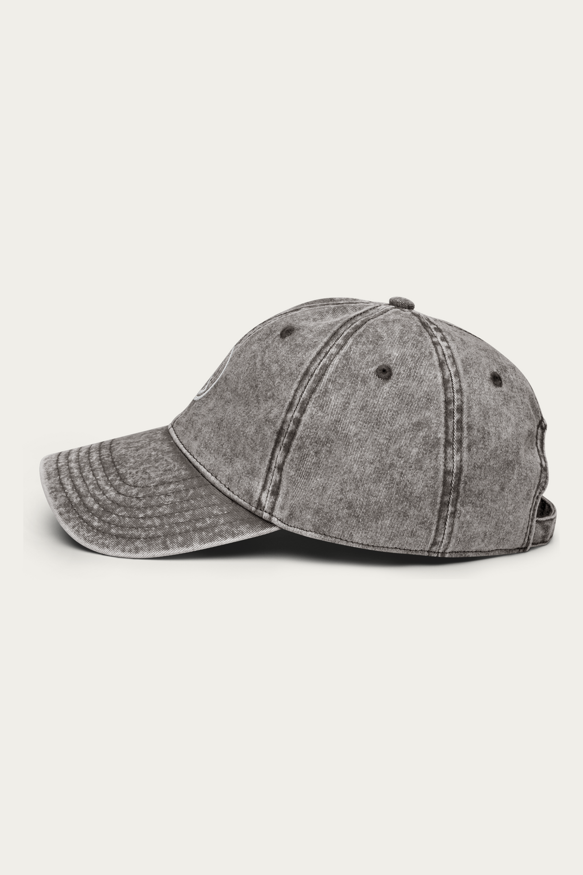 Vintage Cap, Charcoal by Andre Blunt, from the left, on a Cloud White ground